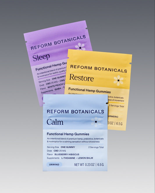Three Reform Botanicals functional hemp gummies pouches in purple, yellow, and light blue, arranged in a fan shape on a gray gradient background.